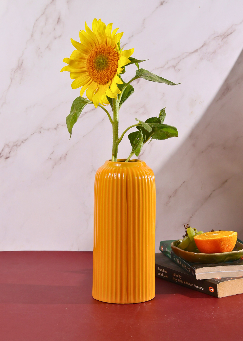 yellow lined vase with glossy finish