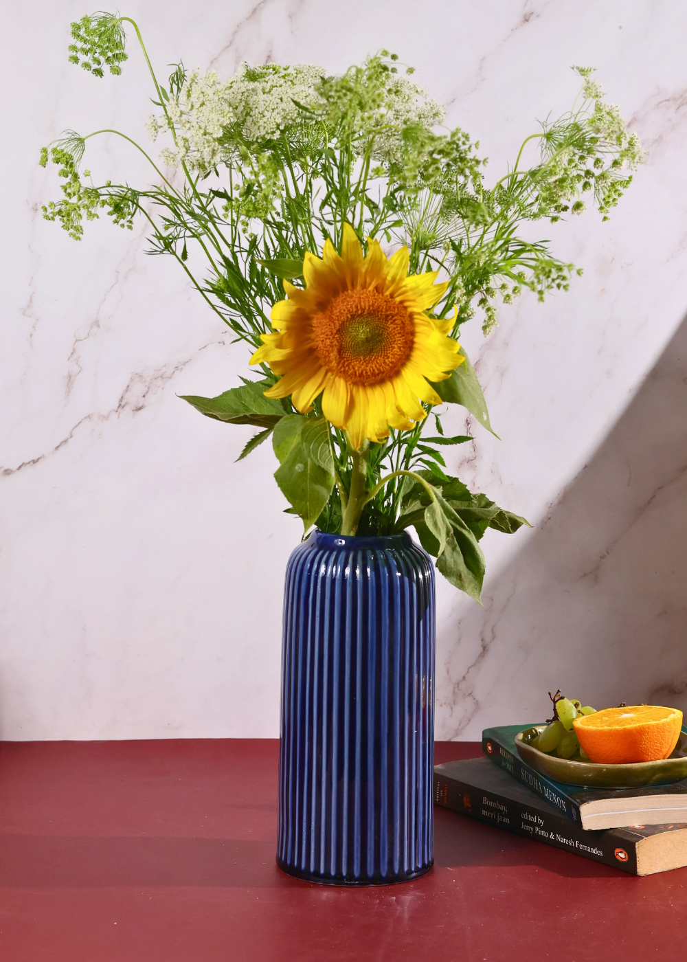 glossy blue lined vase