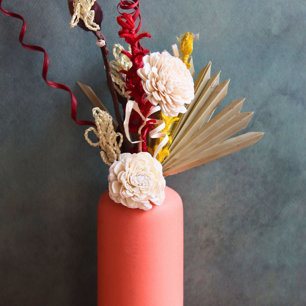 handmade orange vase with assorted bunch combo