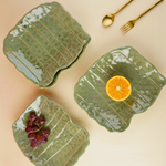 handmade pistachio stoneware platter with golden cutlery