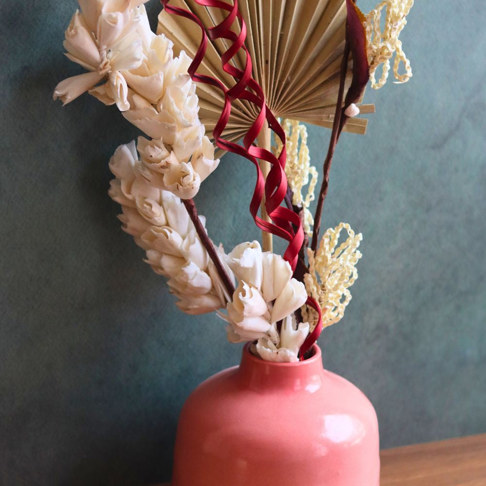 Handmade pink round vase with Assorted bunch combo