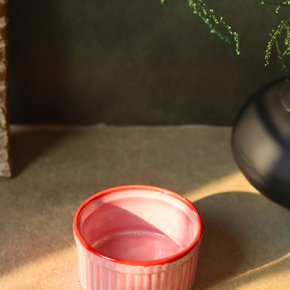 Two ceramic pink kitchenware ramekins