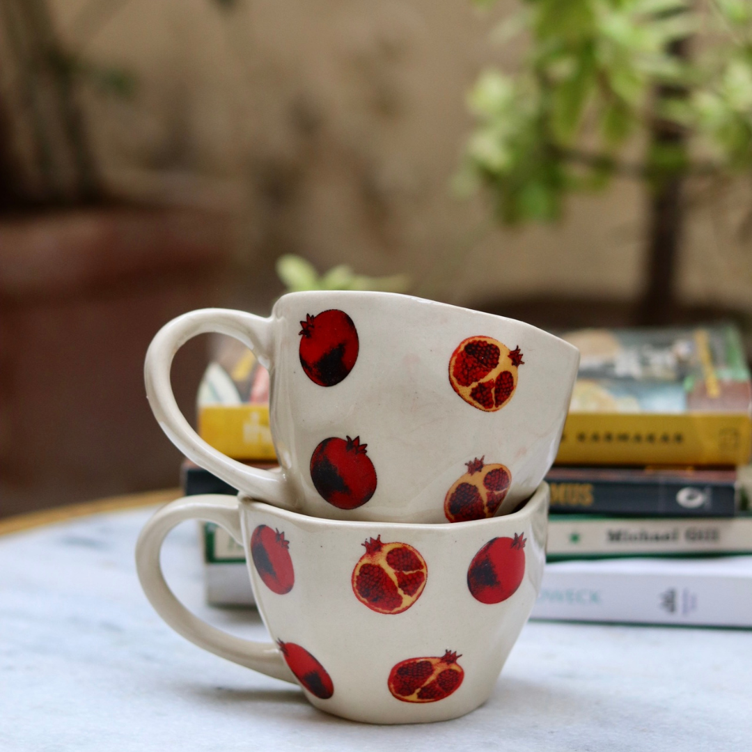 Two handmade ceramic white & red coffee mugs 