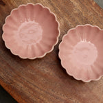 Handmade ice cream bowls on wooden surface