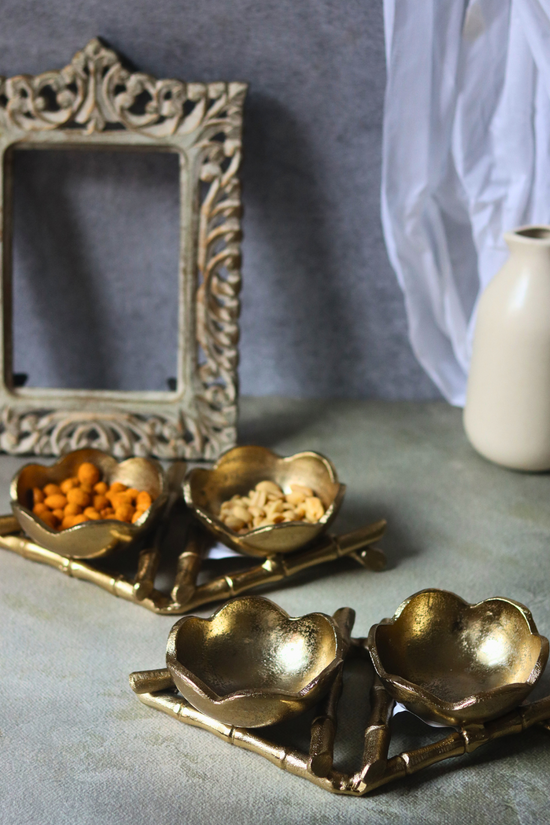 Two serveware golden snack trays 