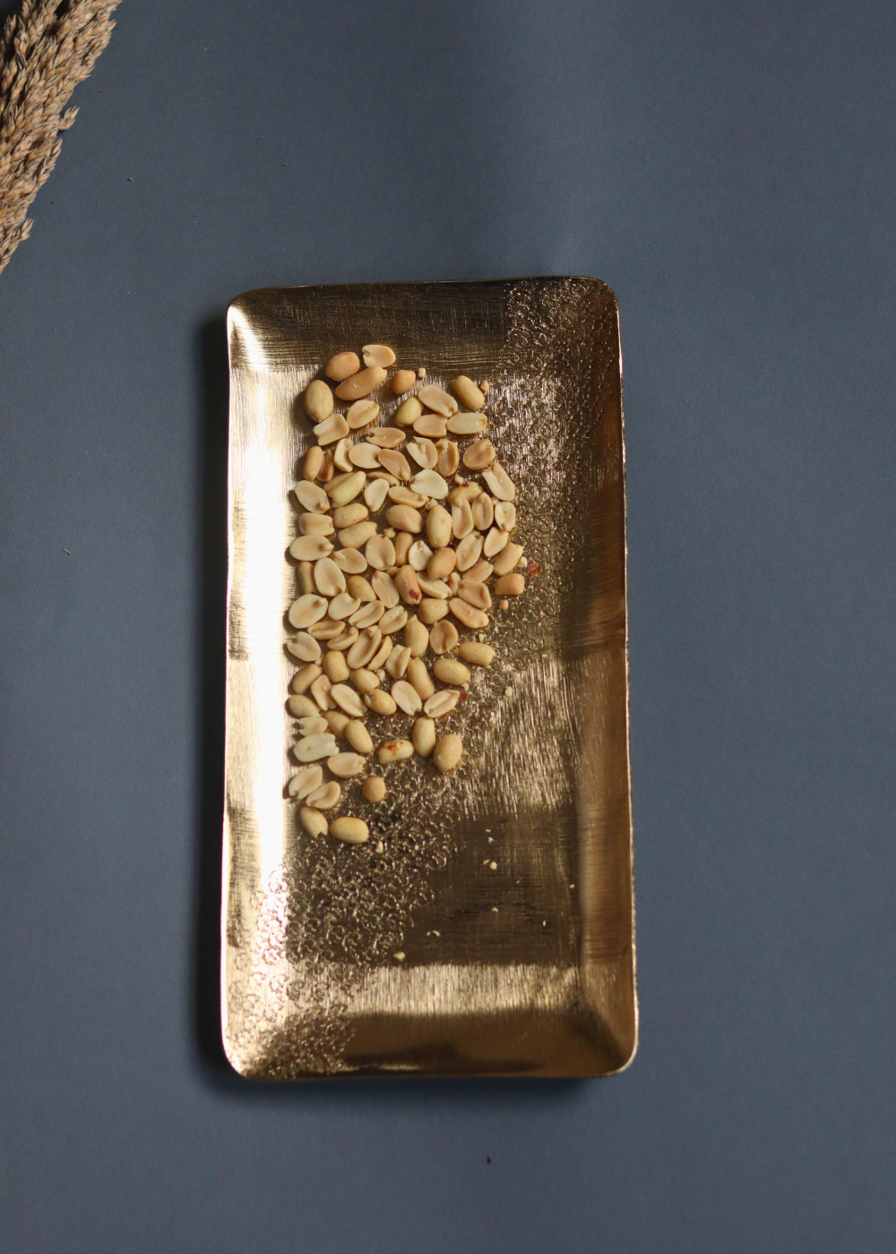 Gold hammered serveware platter with nuts