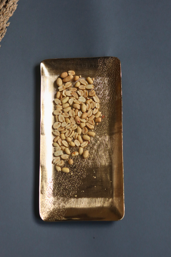 Gold hammered serveware platter with nuts