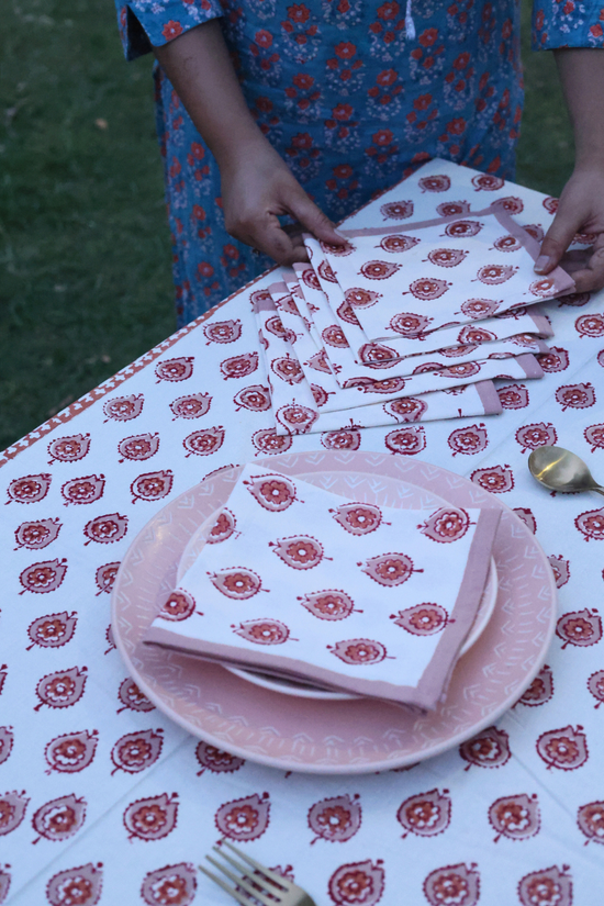 White table napkin with red floral print 