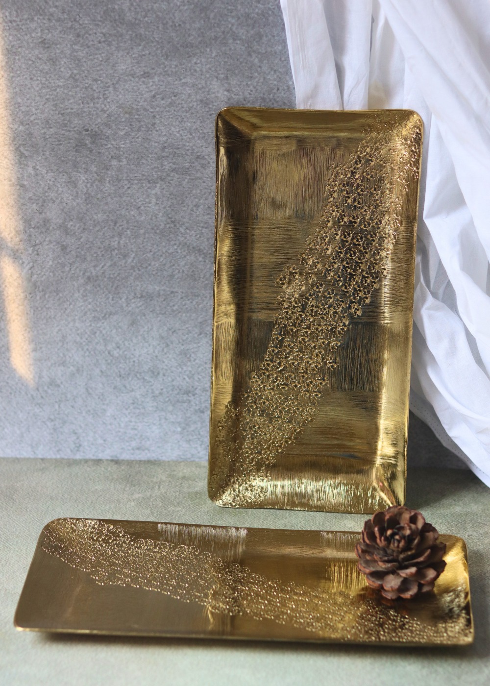Two handmade golden platters