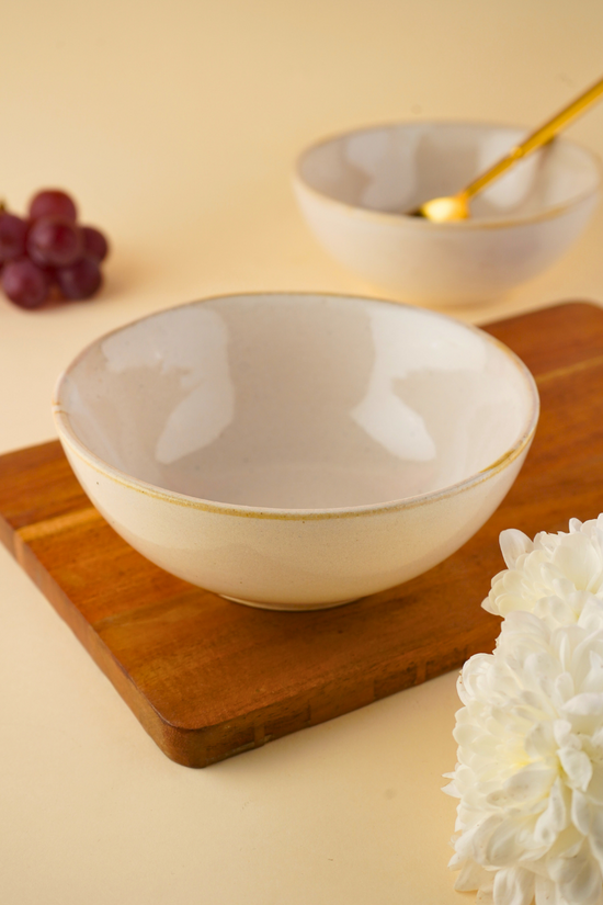 pearl white curry bowl on wooden board