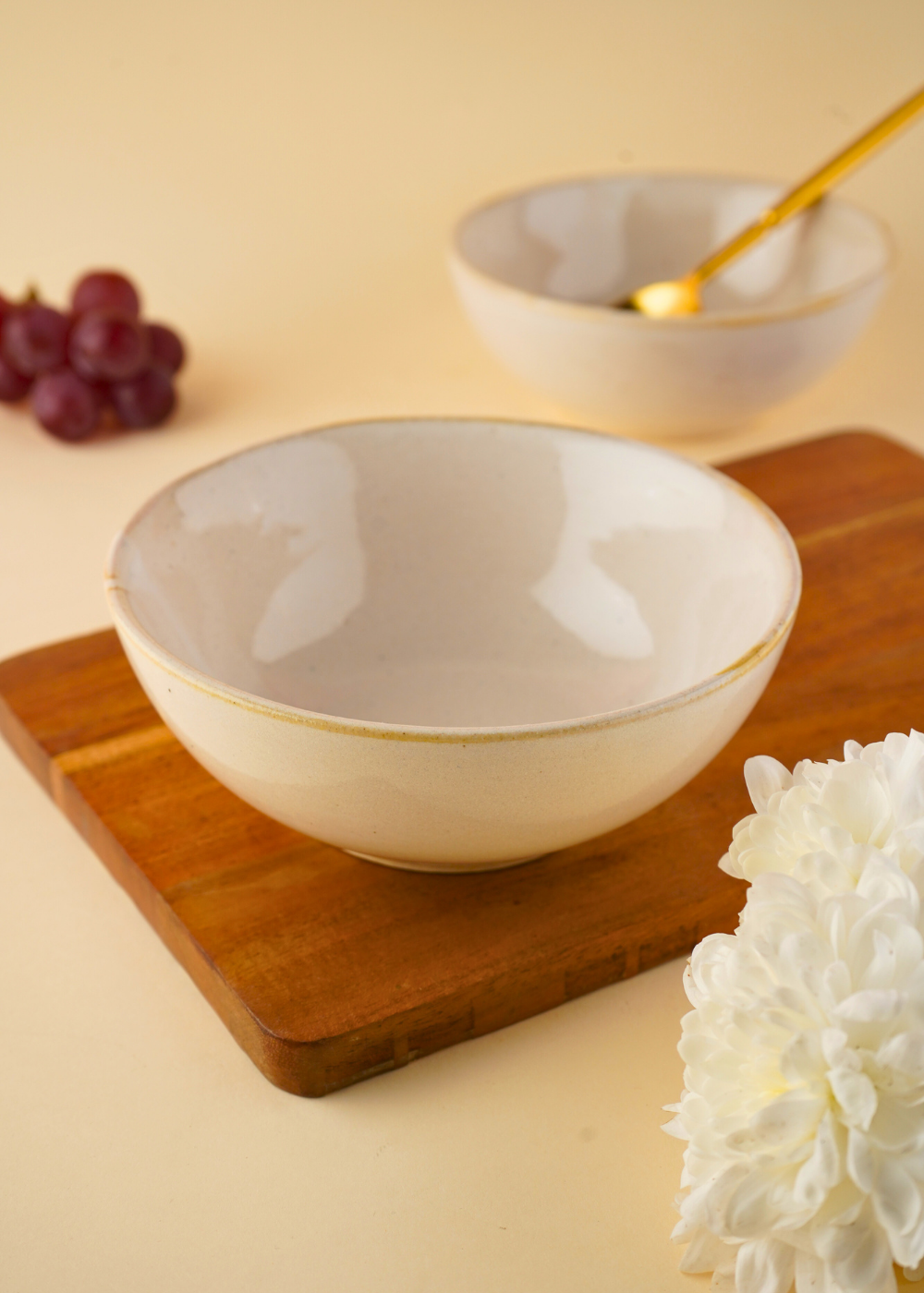 pearl white curry bowl on wooden board