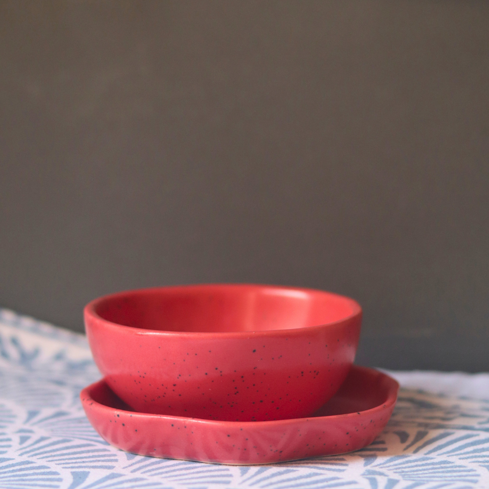 handmade red nut bowl with beautiful red dessert plate