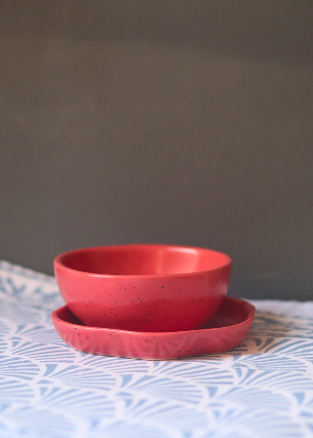 handmade red nut bowl with beautiful red dessert plate