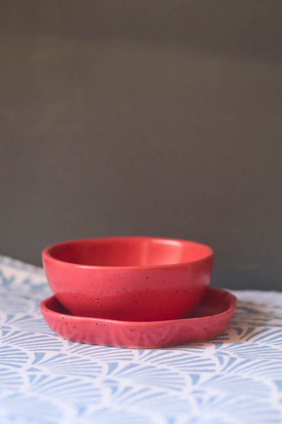 handmade red nut bowl with beautiful red dessert plate