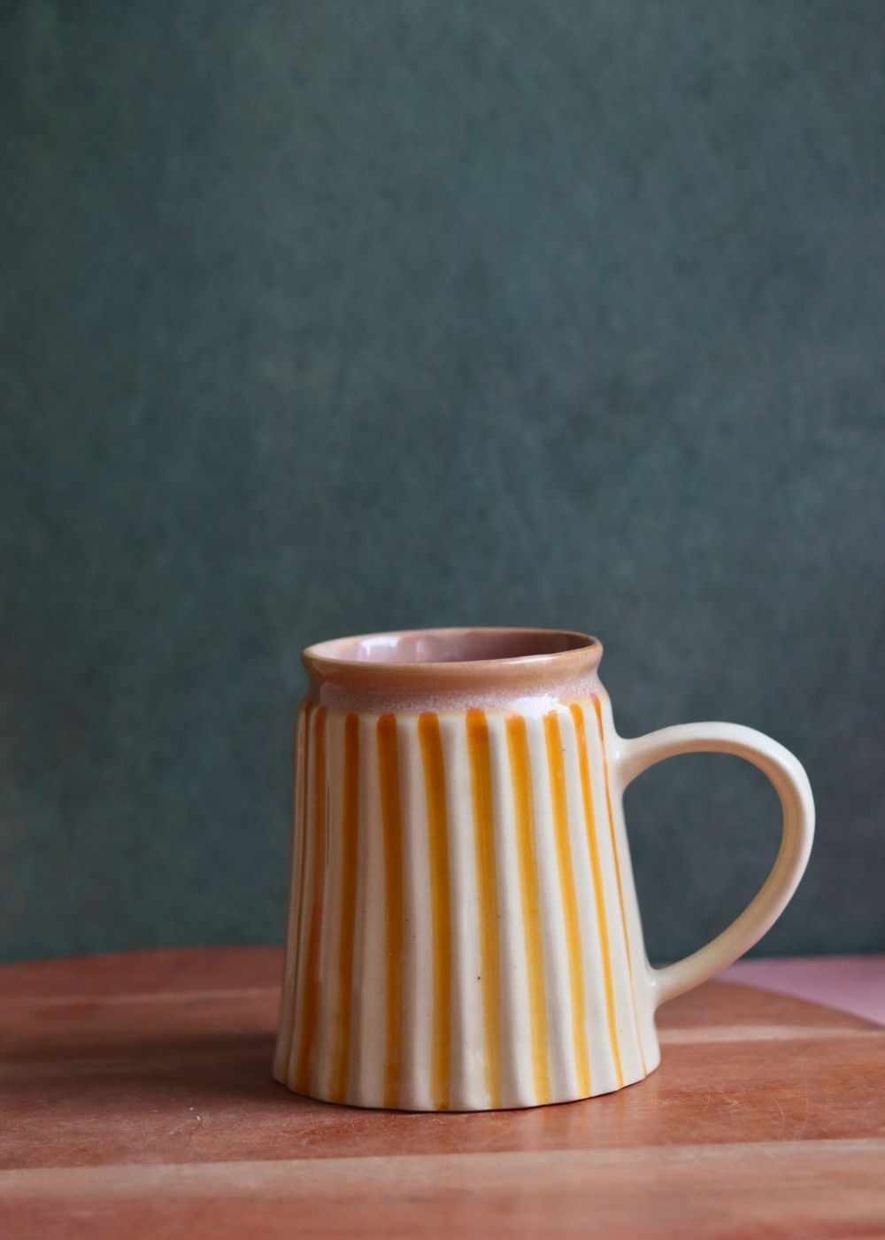 Handmade striped yellow mug