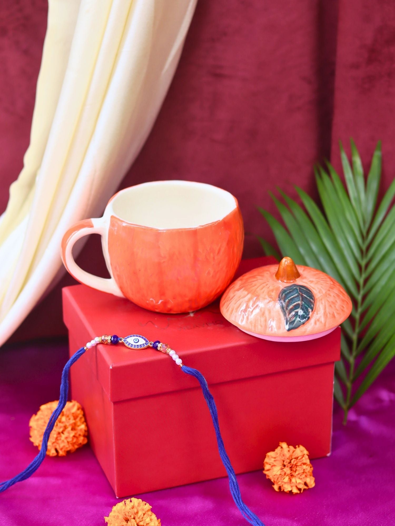 Orange Lid Mug Rakhi gift box made by ceramic