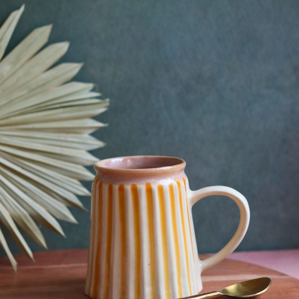 striped yellow mug made by ceramic 