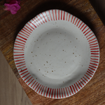 Handmade ceramic red spiky border plate