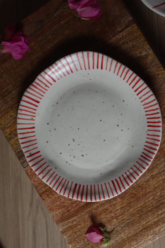 Handmade ceramic red spiky border plate