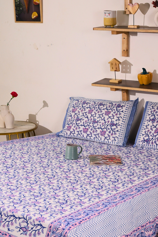 Handprinted bedsheet with pillows