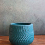 essential teal planter for your indoor space