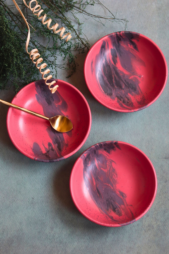 made by ceramic, red bowl, with spoon