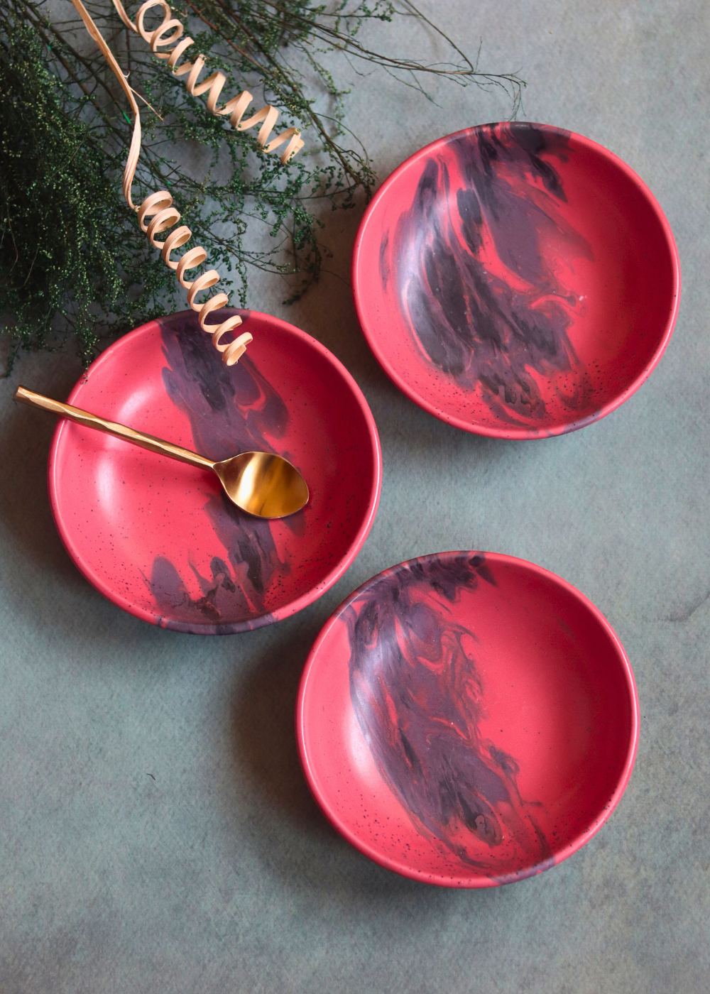 made by ceramic, red bowl, with spoon