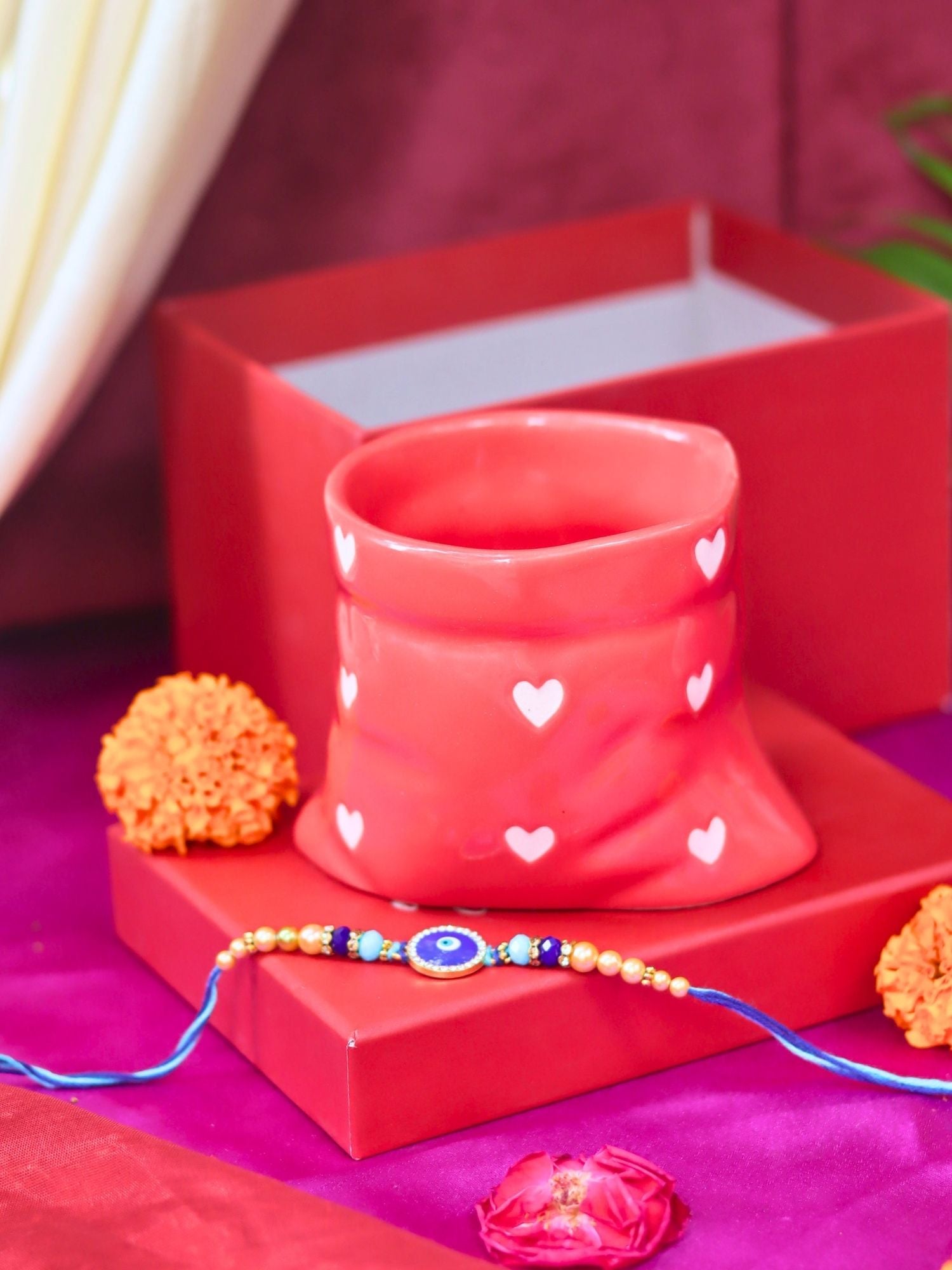 Red Heart Pouch Mug Rakhi gift box made by ceramic
