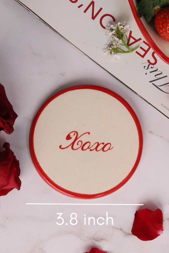 Handmade ceramic xoxo coaster breadth