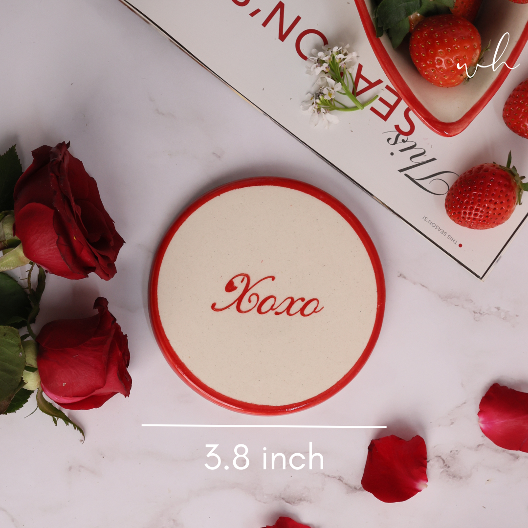 Handmade ceramic xoxo coaster breadth