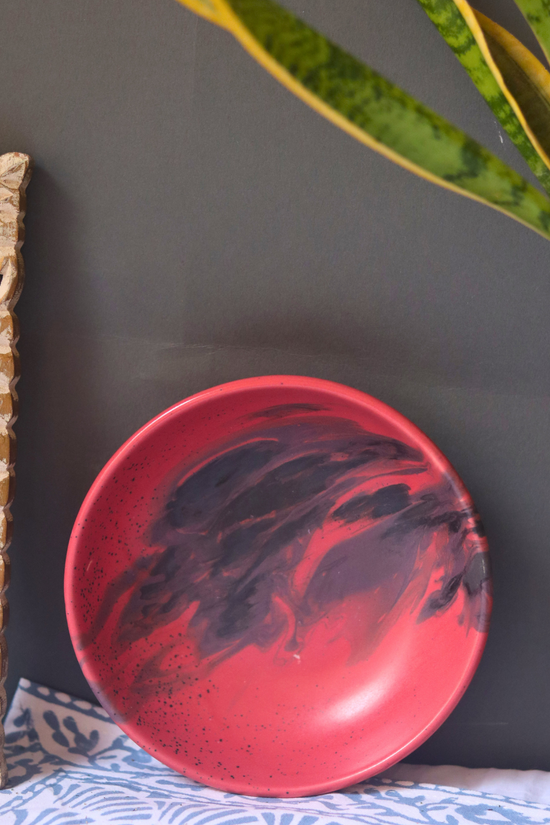 red handmade bowl made by ceramic 