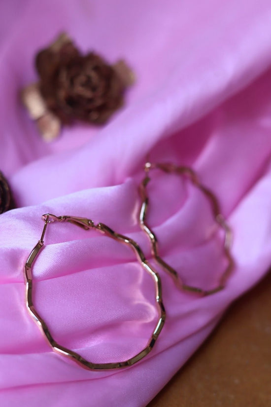 Anti tarnish Twisted Hoops