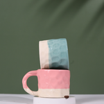 pink & teal handmoulded mugs made by ceramic 