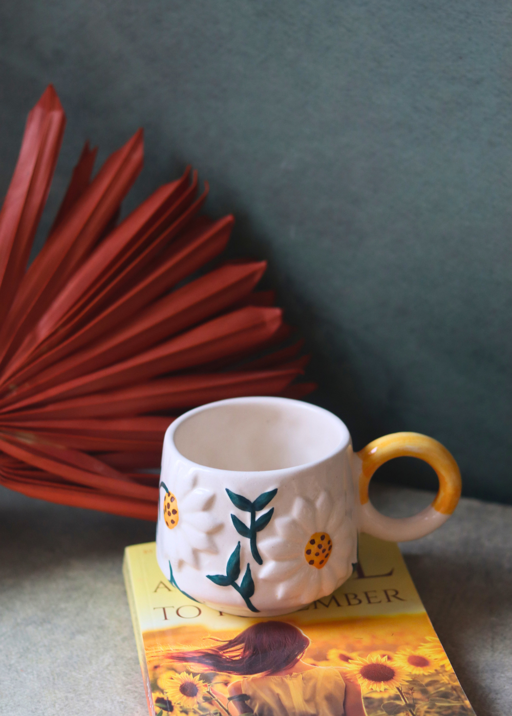 Daisy Bloom Coffee Mug On Book