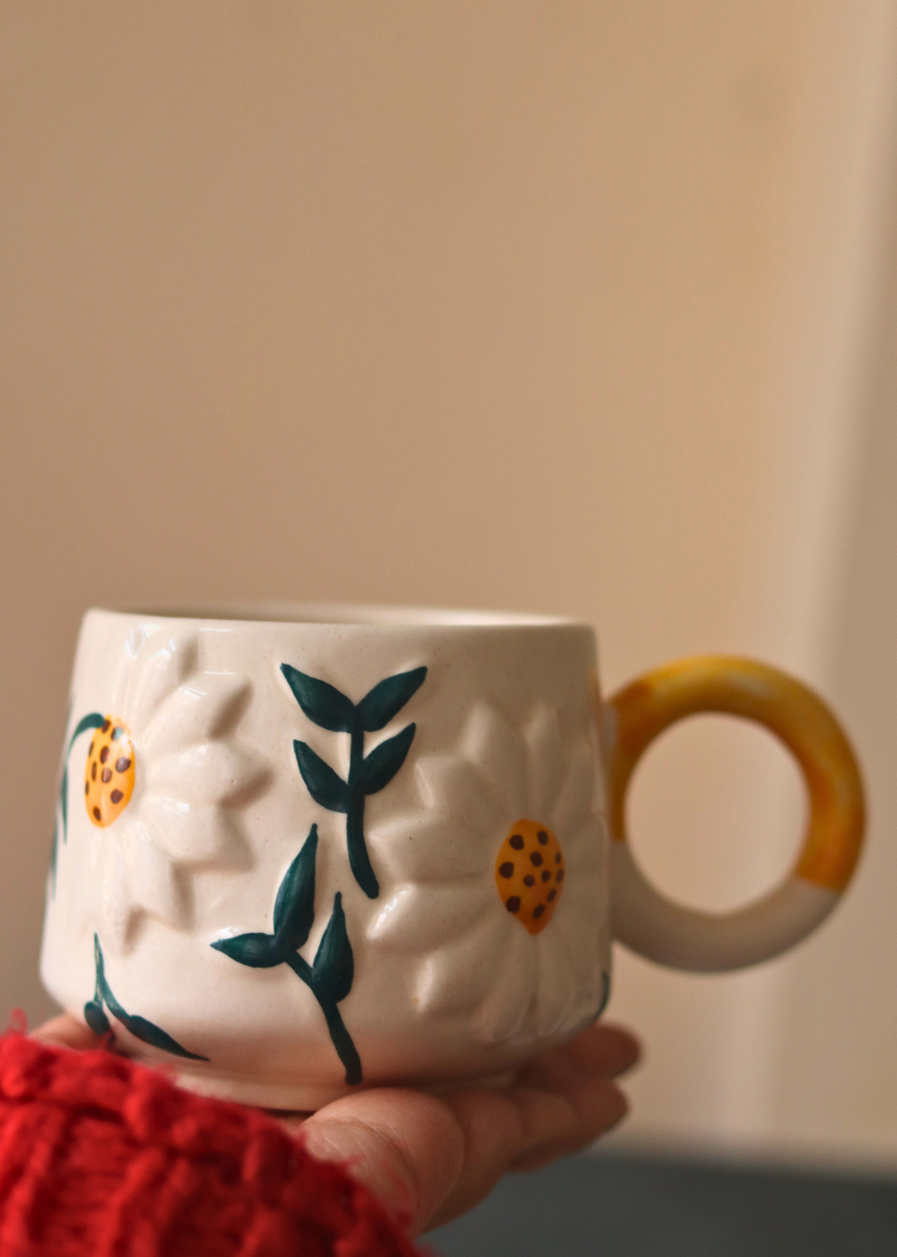 Drinkware coffee mug in hand 