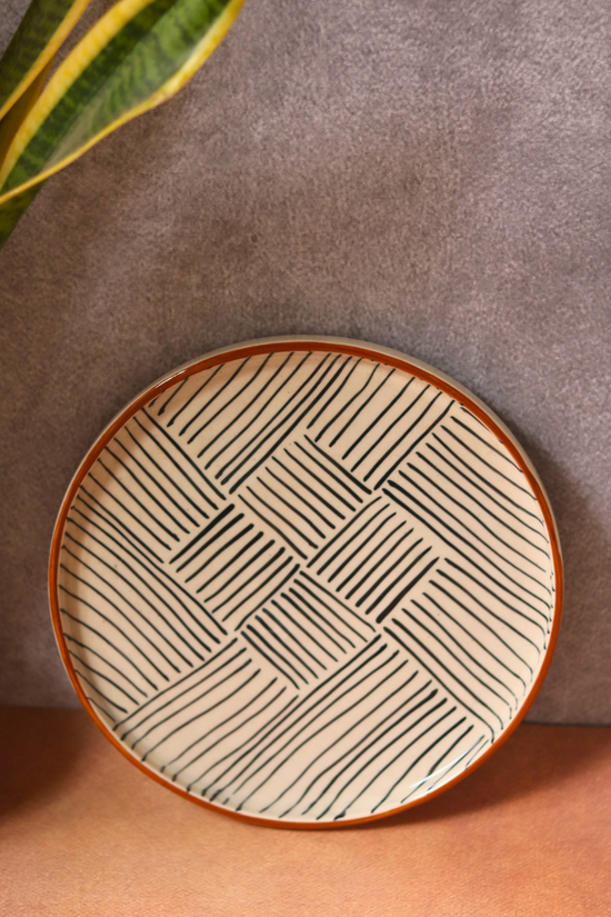 Black lines in ceramic serveware platter