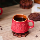 Red serene leaf coffee mug with coffee 