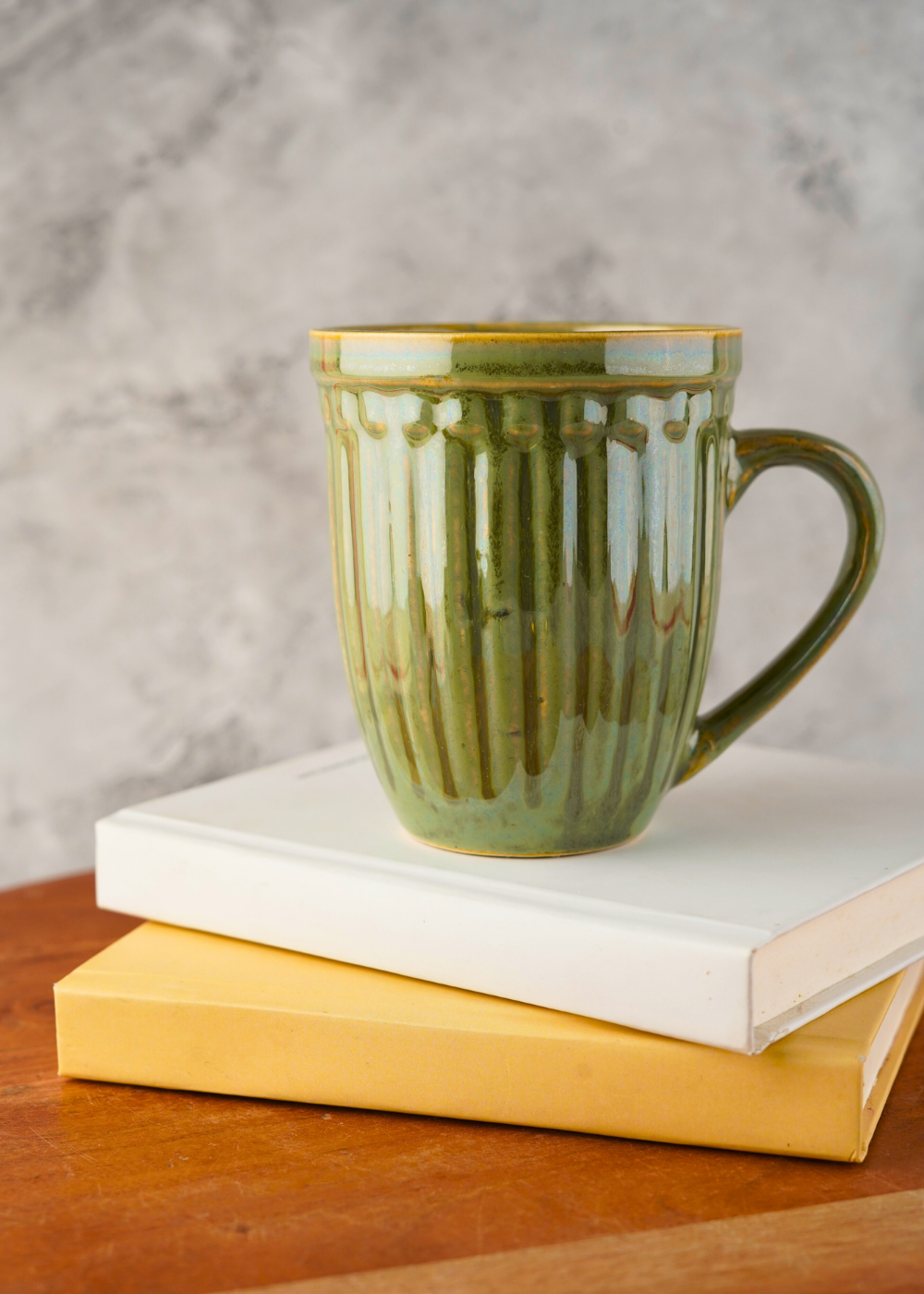 moss green mug with adorable design 