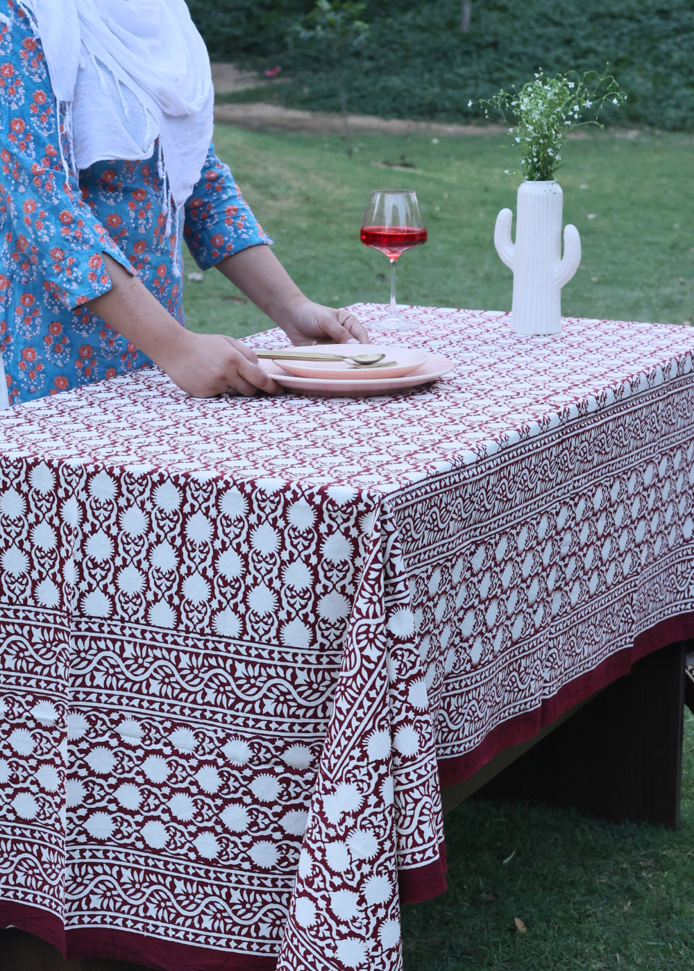 Maroon table cloth on table 