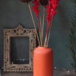 Orange bloom ceramic flower vase with flowers