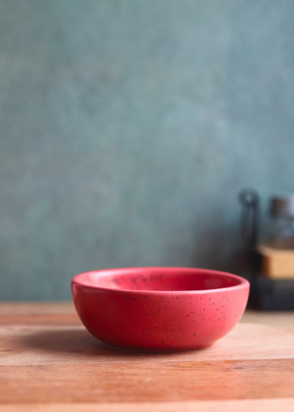 red nut bowl made by ceramic 