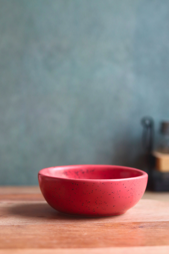 red nut bowl made by ceramic 