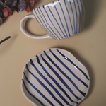 handmade blue lined mugs & blue lined dessert plate with blue & white color