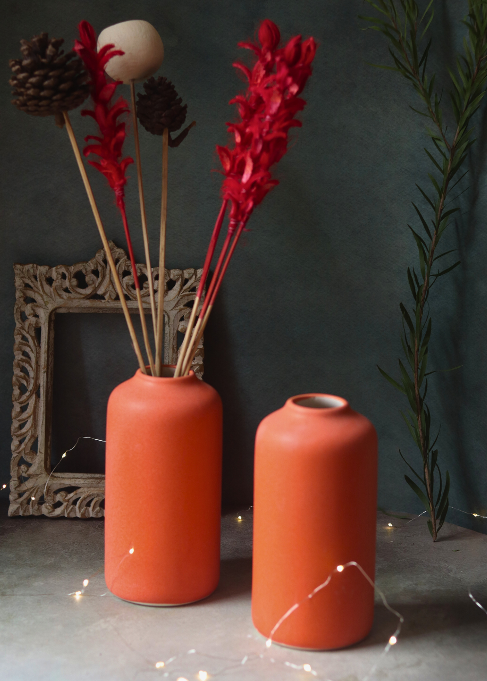Two flower pots with flowers 