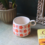 Orange floral ceramic coffee mug