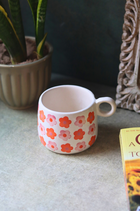 Orange floral ceramic coffee mug