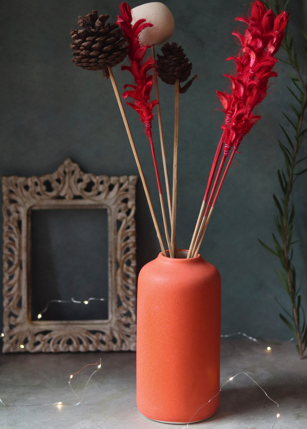 Handmade ceramic flower vase with dried flowers