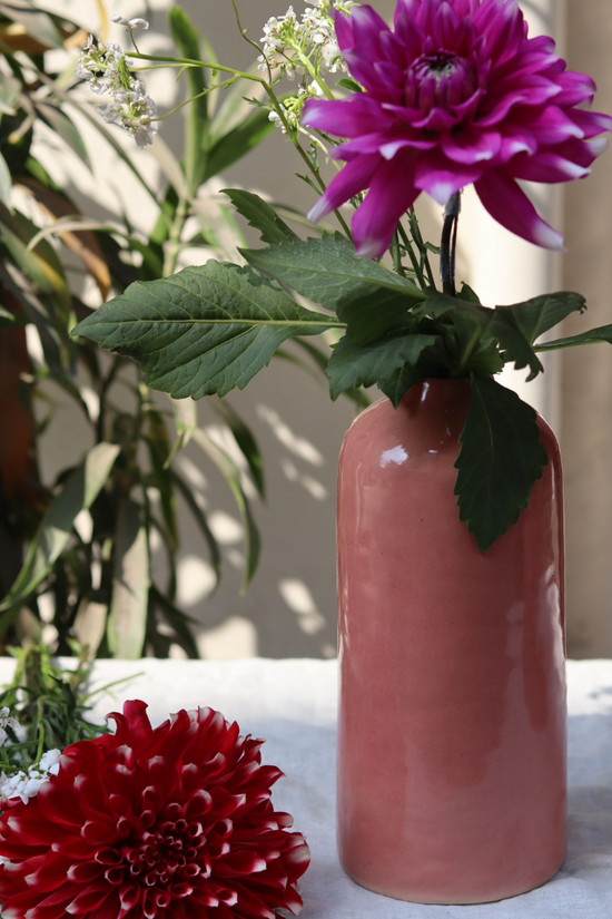 pink tall vase made by ceramic 