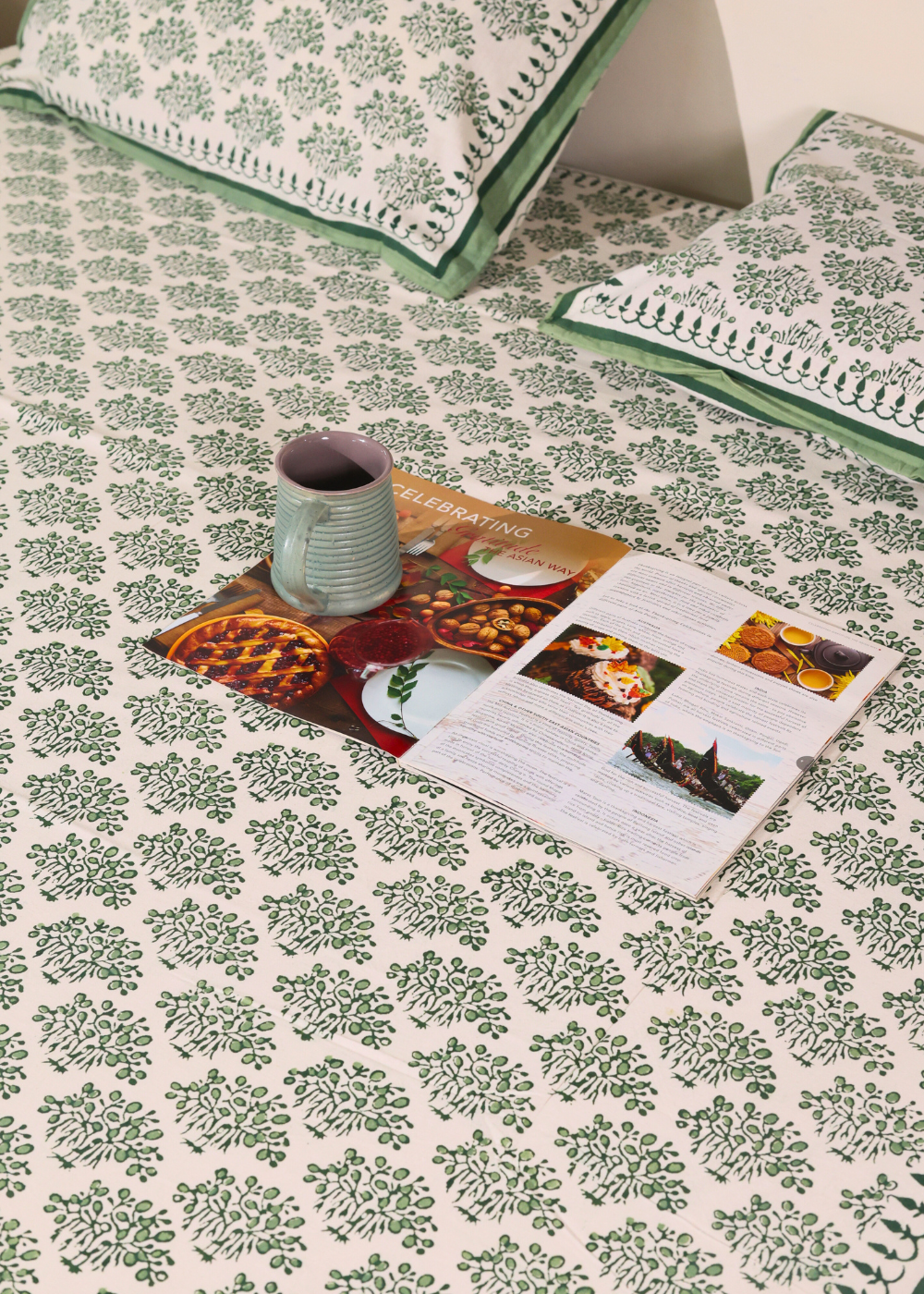 Green banyan tree bedsheet with mug & magazine