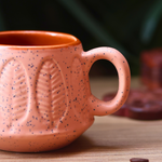 Closeup shot peach serene coffee mug 
